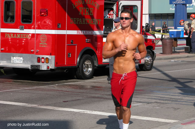 This fit fireman lept out of bed from his Belmont Shore home and runs for his uniform before helping to fight the blaze.