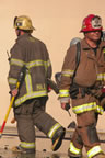 Long Beach firefighters headed in all directions attacking the fire from all sides. (57kb)