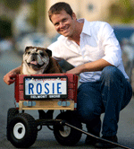 Rosie in her wagon with Justin!